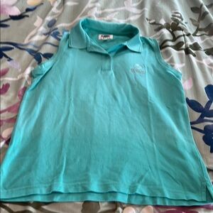 Aqua colored golf shirt with collar